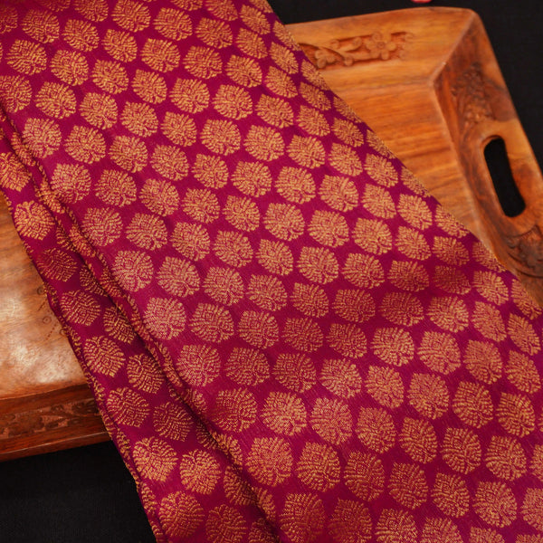 close view of premium bridal kanchipuram silk saree in Aesthetic maroon colour in pure gold zari