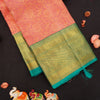  close view of premium bridal kanchipuram silk saree in peach orange colour with korvai border