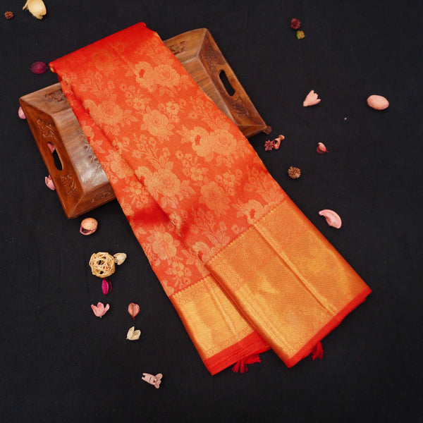  close view of premium bridal kanchipuram silk saree red half tissue in traditional borders