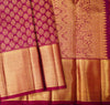 close view of premium bridal kanchipuram silk saree in Aesthetic maroon colour in pure gold zari