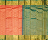  close view of premium bridal kanchipuram silk saree in peach orange colour with korvai border