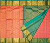  close view of premium bridal kanchipuram silk saree in peach orange colour with korvai border