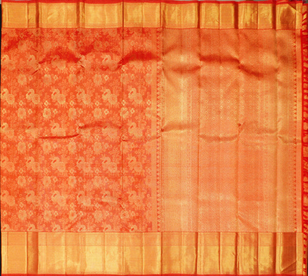  close view of premium bridal kanchipuram silk saree red half tissue in traditional borders
