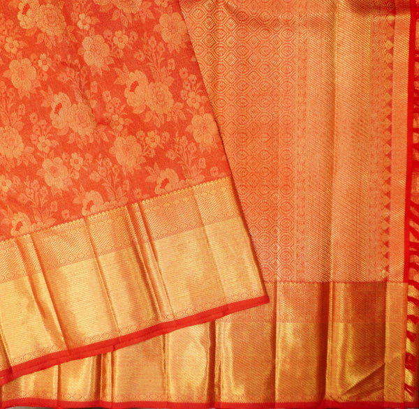  close view of premium bridal kanchipuram silk saree red half tissue in traditional borders