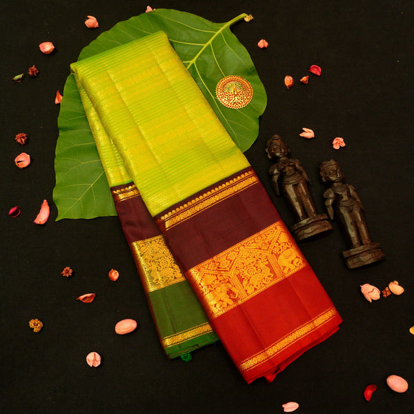 premium veldhari zaari lines kanchipuram silk saree in parrot green 