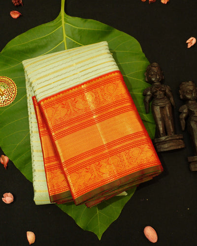 Pista Green Kanchipuram Silk Saree With Korvai Boder
