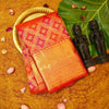 Close view of premium bridal kanchipuram silk saree in red colour with Geomentric Diamond Zari Motifs