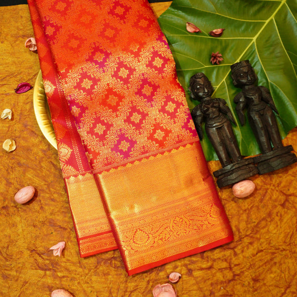 Close view of premium bridal kanchipuram silk saree in red colour with Geomentric Diamond Zari Motifs