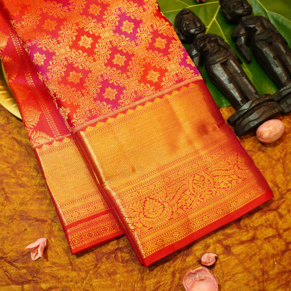 Close view of premium bridal kanchipuram silk saree in red colour with Geomentric Diamond Zari Motifs