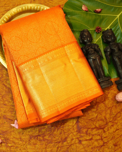 Rust Orange Kanjivaram Silk Saree With Traditional Gold Zari Border