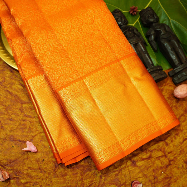 premium traditional wedding kanchipuram silk saree inRust orange with floral checks