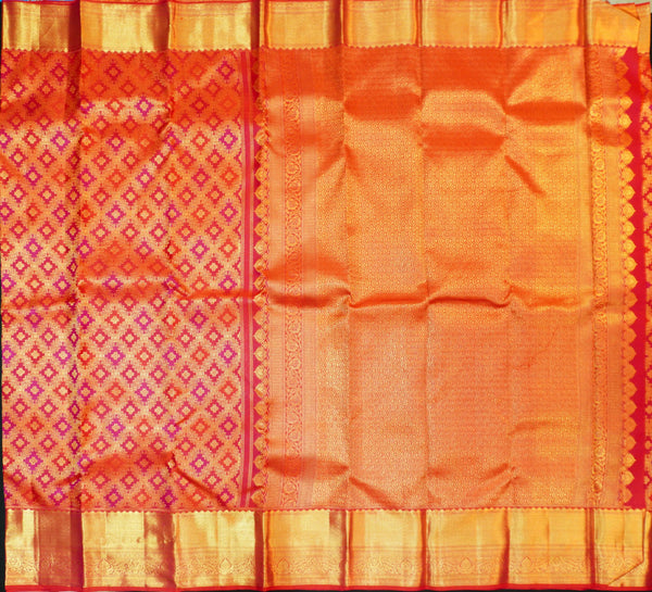 Close view of premium bridal kanchipuram silk saree in red colour with Geomentric Diamond Zari Motifs