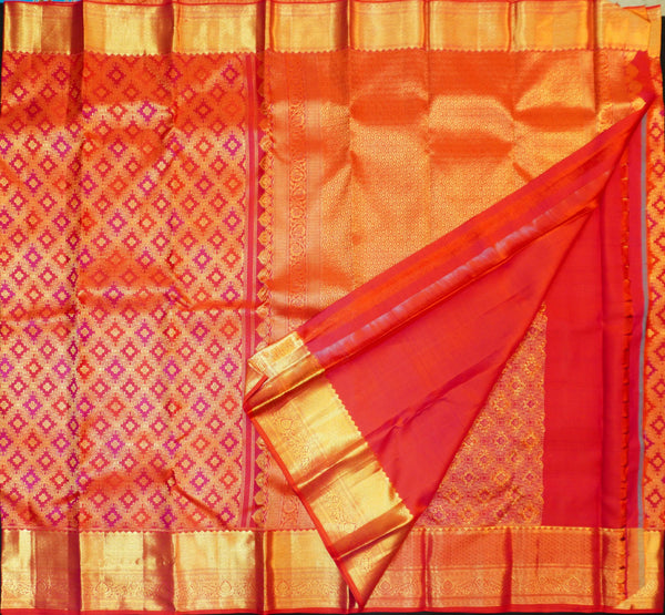 Close view of premium bridal kanchipuram silk saree in red colour with Geomentric Diamond Zari Motifs