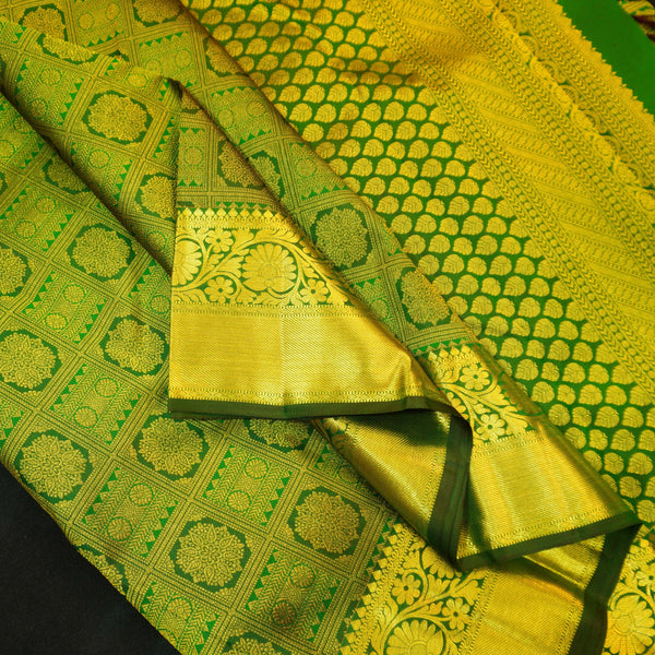 Close view of premium Traditional kanchipuram silk saree in Bottle Green colour with Pearl Beaded Grid Checks