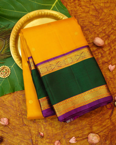 Mustard Yellow Kanchipuram Silk Saree with Retta Pettu Korvai Border