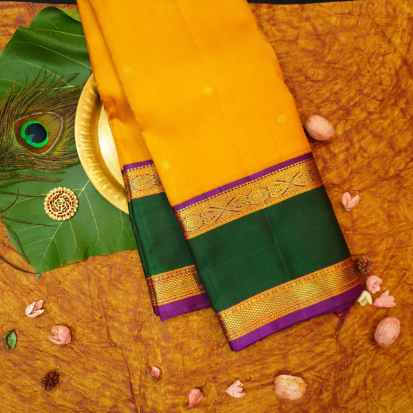  Premeium Traditional kanchipuram silk saree in Mustard Yellow colour with retta pettu korvai border