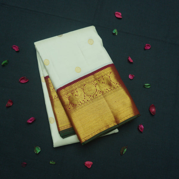 Half White Korvai Kanchipuram Silk Saree with Chakaram Butta and Maroon Border