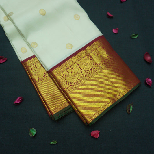 Half White Korvai Kanchipuram Silk Saree with Chakaram Butta and Maroon Border