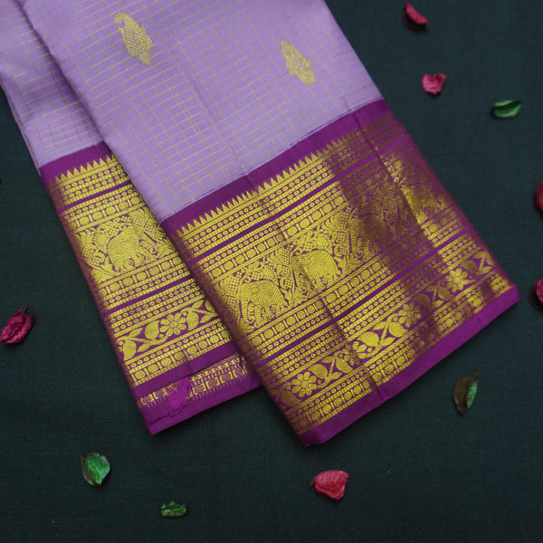 Exquisite Violet Kanchipuram Silk Saree with Golden Zari Butta Border