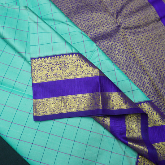 Sky Blue Kanchipuram Silk Saree with Golden Zari Butta Border