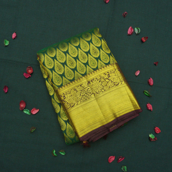 Traditional Dark Green Kanchipuram Silk Saree with Zari Thilagam Design
