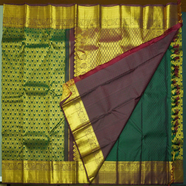 Traditional Dark Green Kanchipuram Silk Saree with Zari Thilagam Design - Vivaaha Silks & Sarees