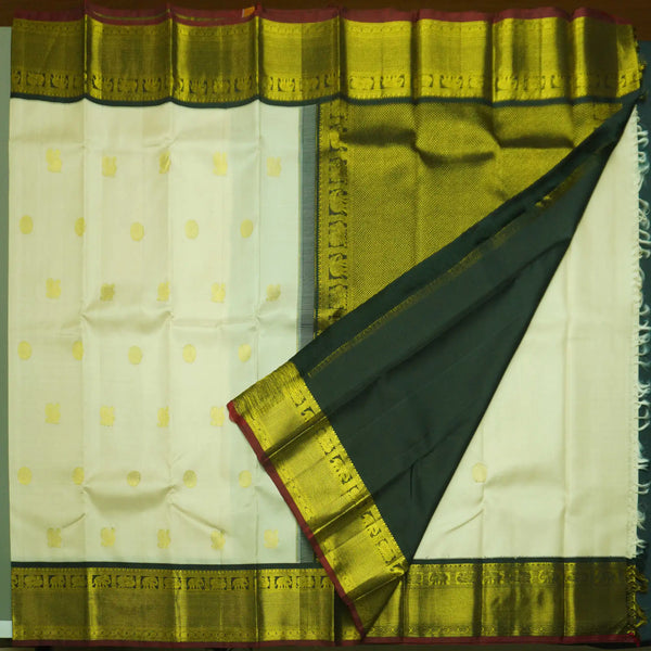 Traditional Half White with Black Kanchipuram Silk Saree – Annapakshi & Chakaram Motifs
