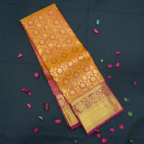 Traditional Pumpkin Orange Kanchipuram Silk Saree with Zari Chakaram Brocade and Magenta Korvai Border - Vivaaha Silks & Sarees