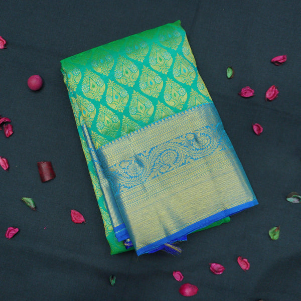 Jungle Green Bridal Kanchipuram Silk Saree with Blue Border - Vivaaha Silks & Sarees