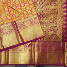 Load image into Gallery viewer, Traditional Pumpkin Orange Kanchipuram Silk Saree with Zari Chakaram Brocade and Magenta Korvai Border
