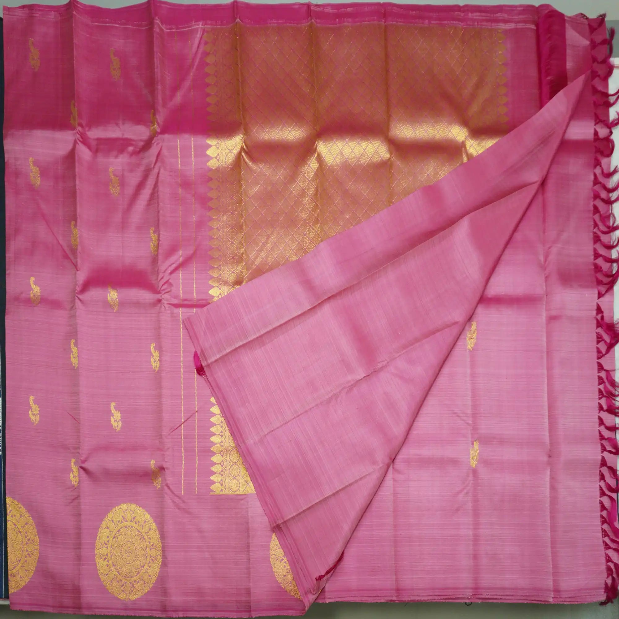 Pink Borderless Kanchipuram Silk Saree with Floral & Paisley Motifs
