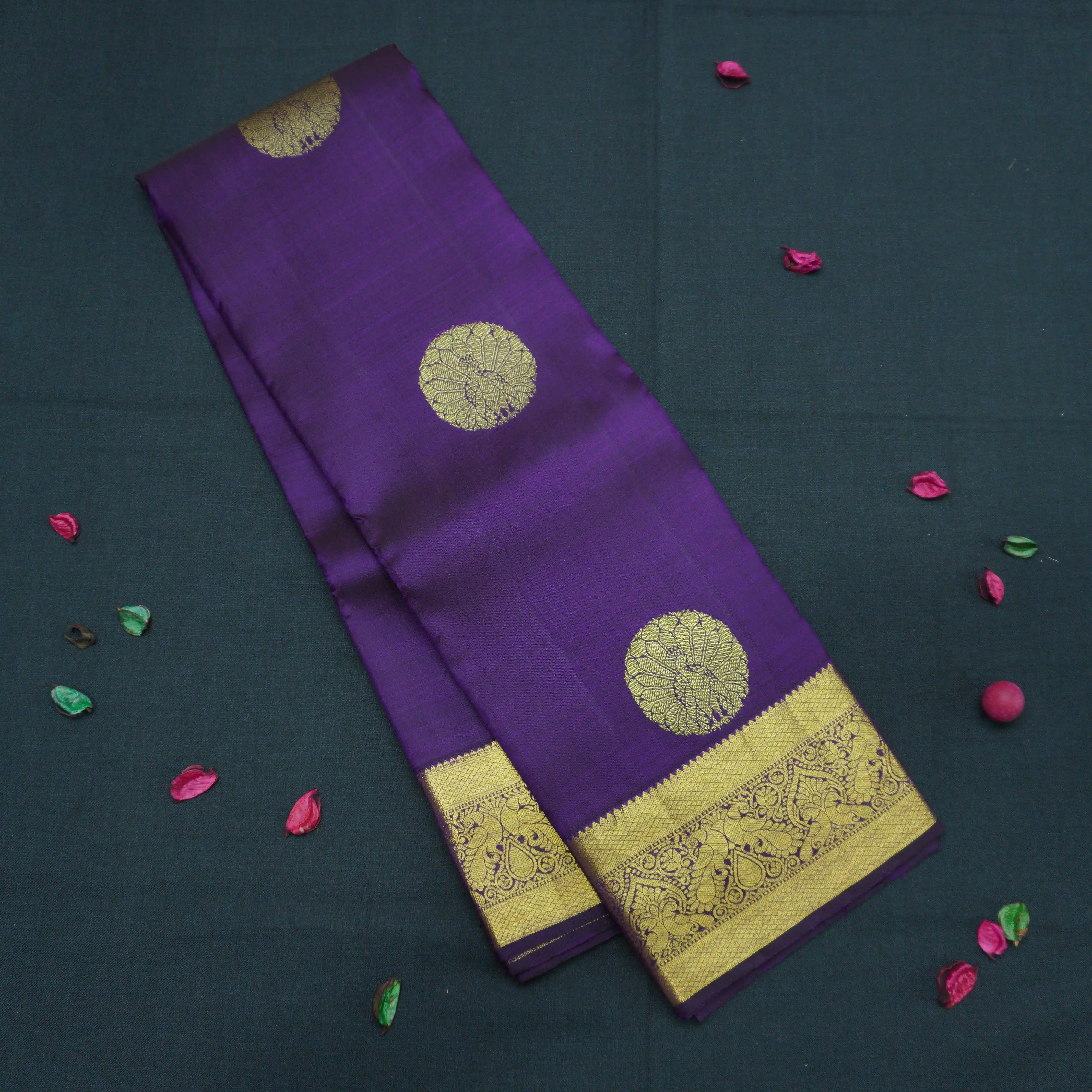 Handloom Kanchipuram Silk Saree in Navalpazham with Traditional Peacock Design