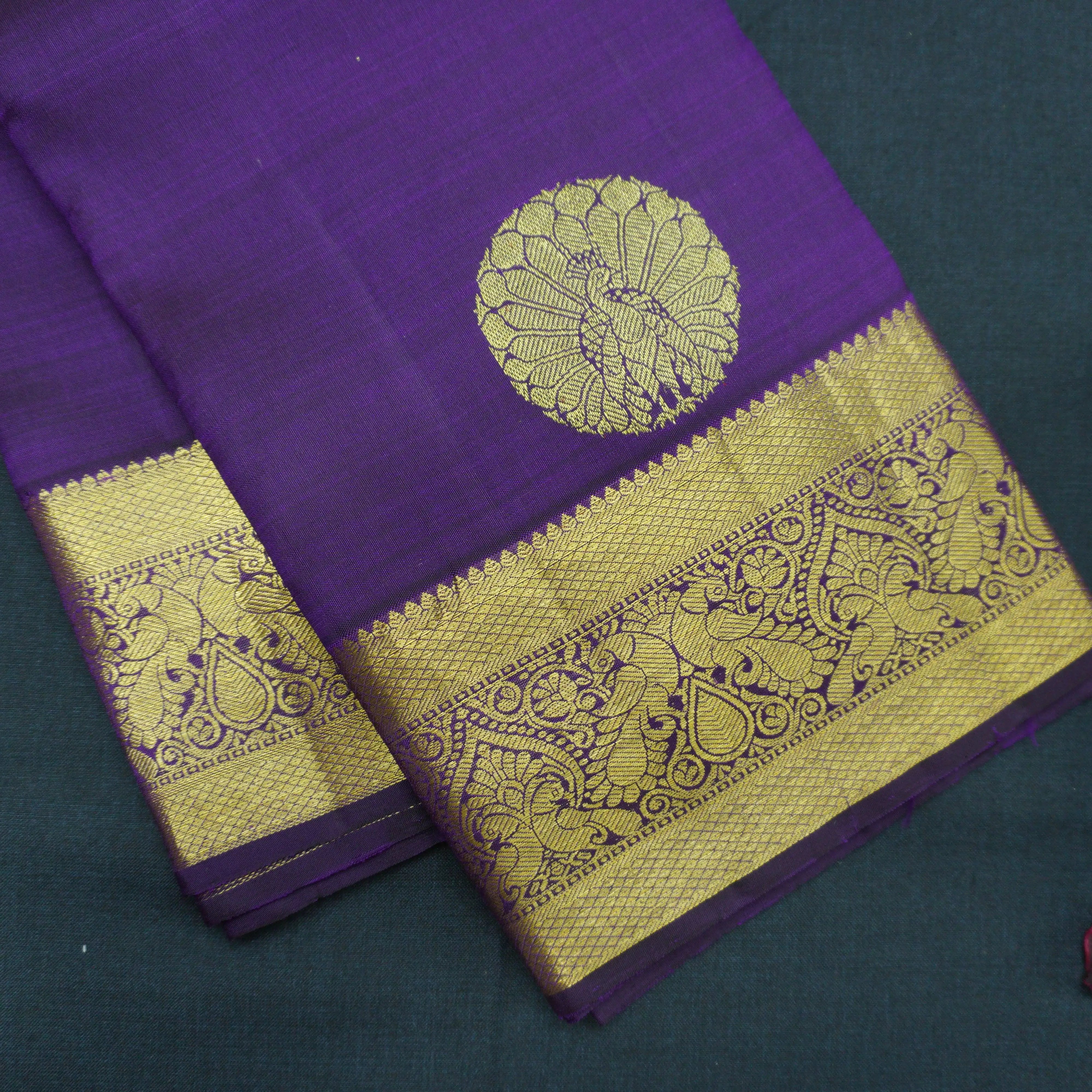 Handloom Kanchipuram Silk Saree in Navalpazham with Traditional Peacock Design