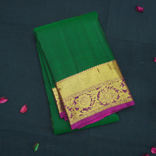 Load image into Gallery viewer, Bottle Green Kanchipuram Handloom Silk Saree with Purple Zari Border
