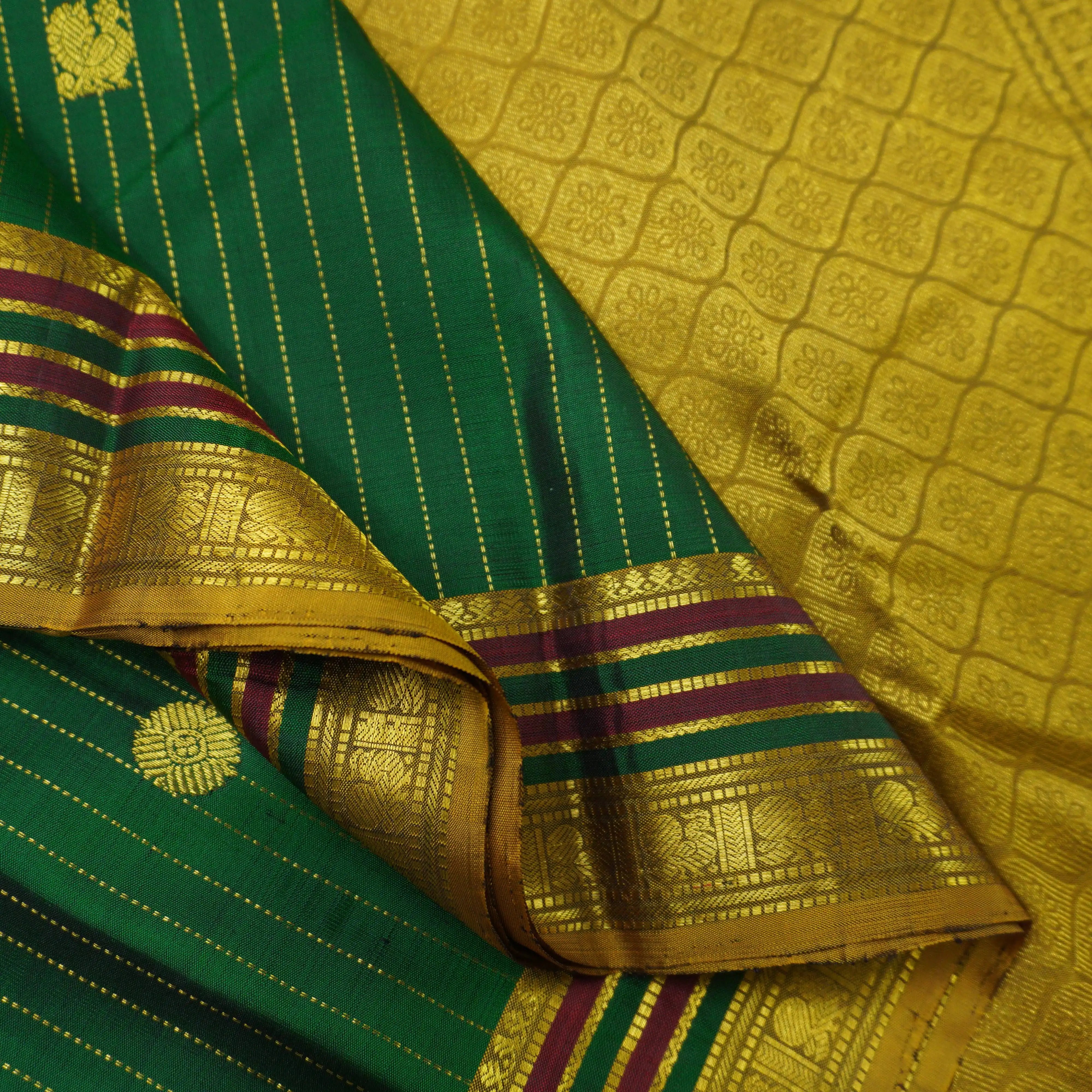 Green Kanchipuram Silk Saree with Zari Butta and Multi-Color Threadwork Border