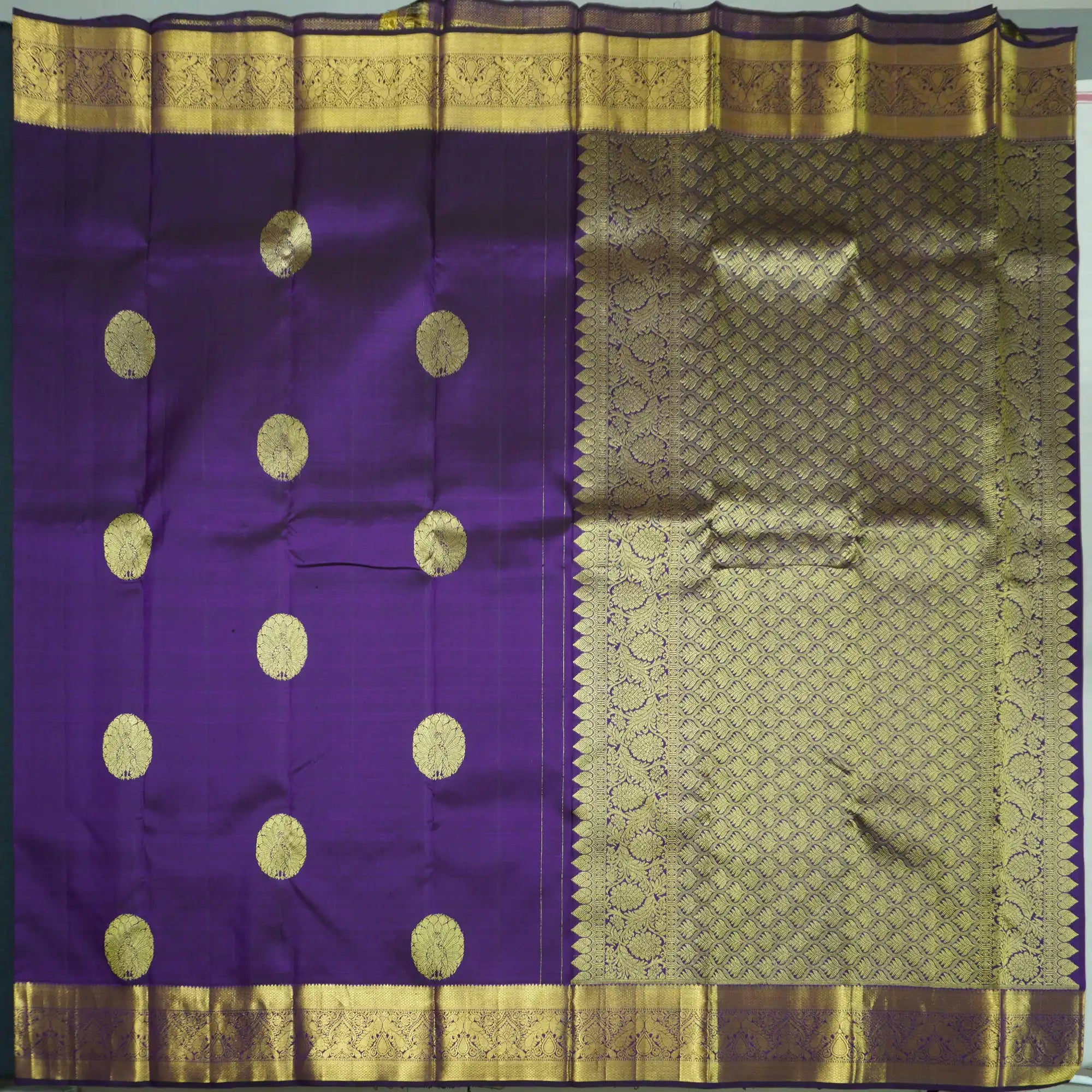 Handloom Kanchipuram Silk Saree in Navalpazham with Traditional Peacock Design