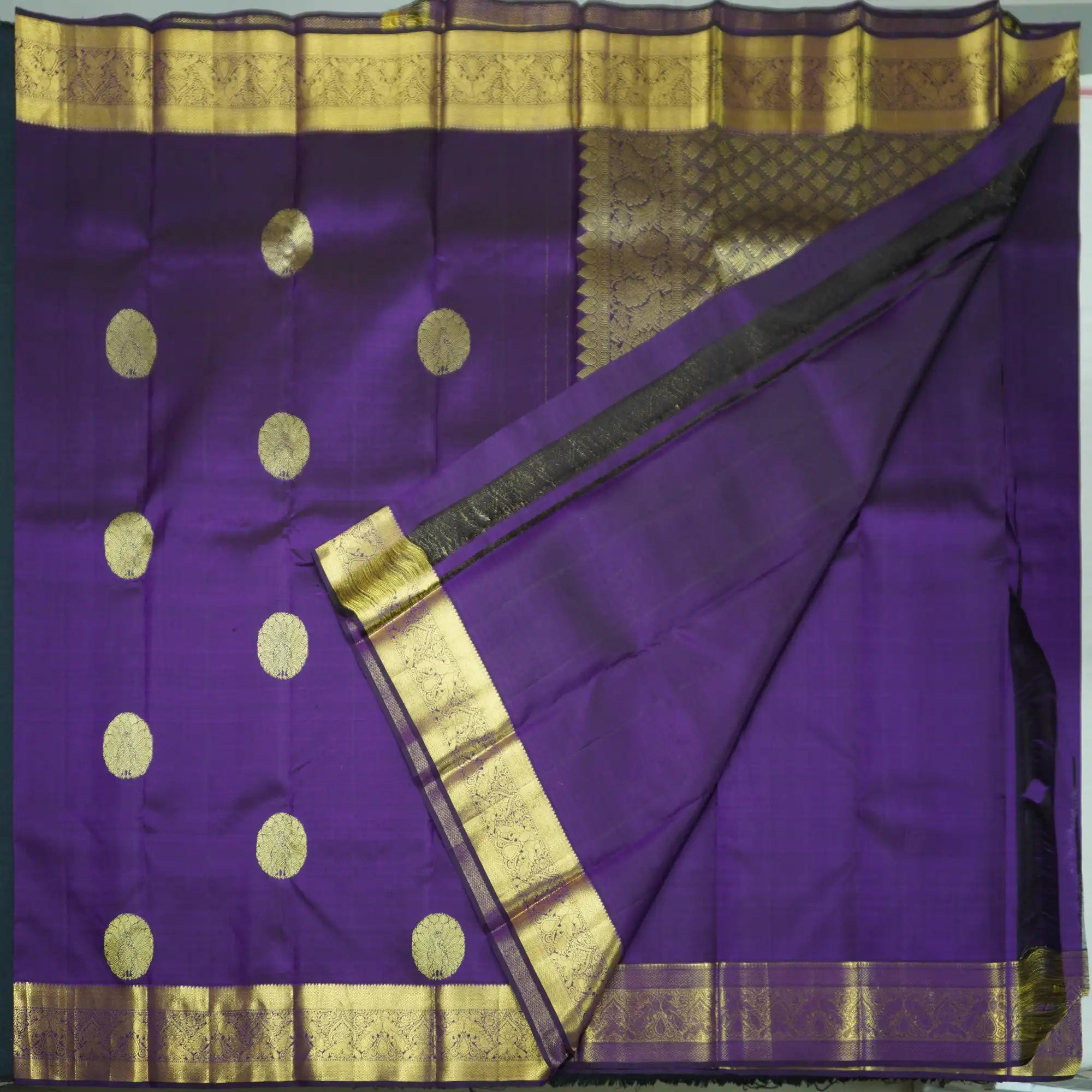 Handloom Kanchipuram Silk Saree in Navalpazham with Traditional Peacock Design