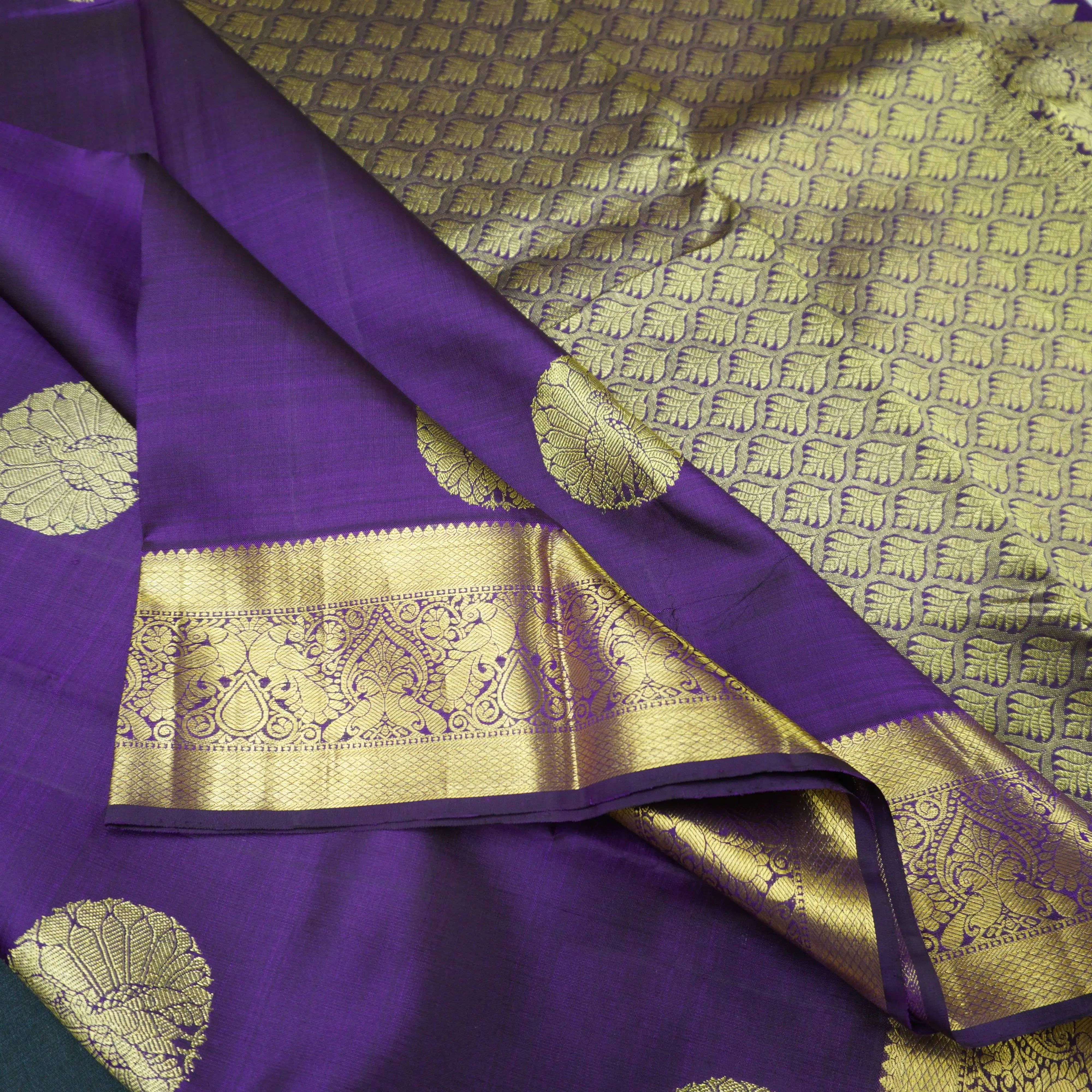 Handloom Kanchipuram Silk Saree in Navalpazham with Traditional Peacock Design