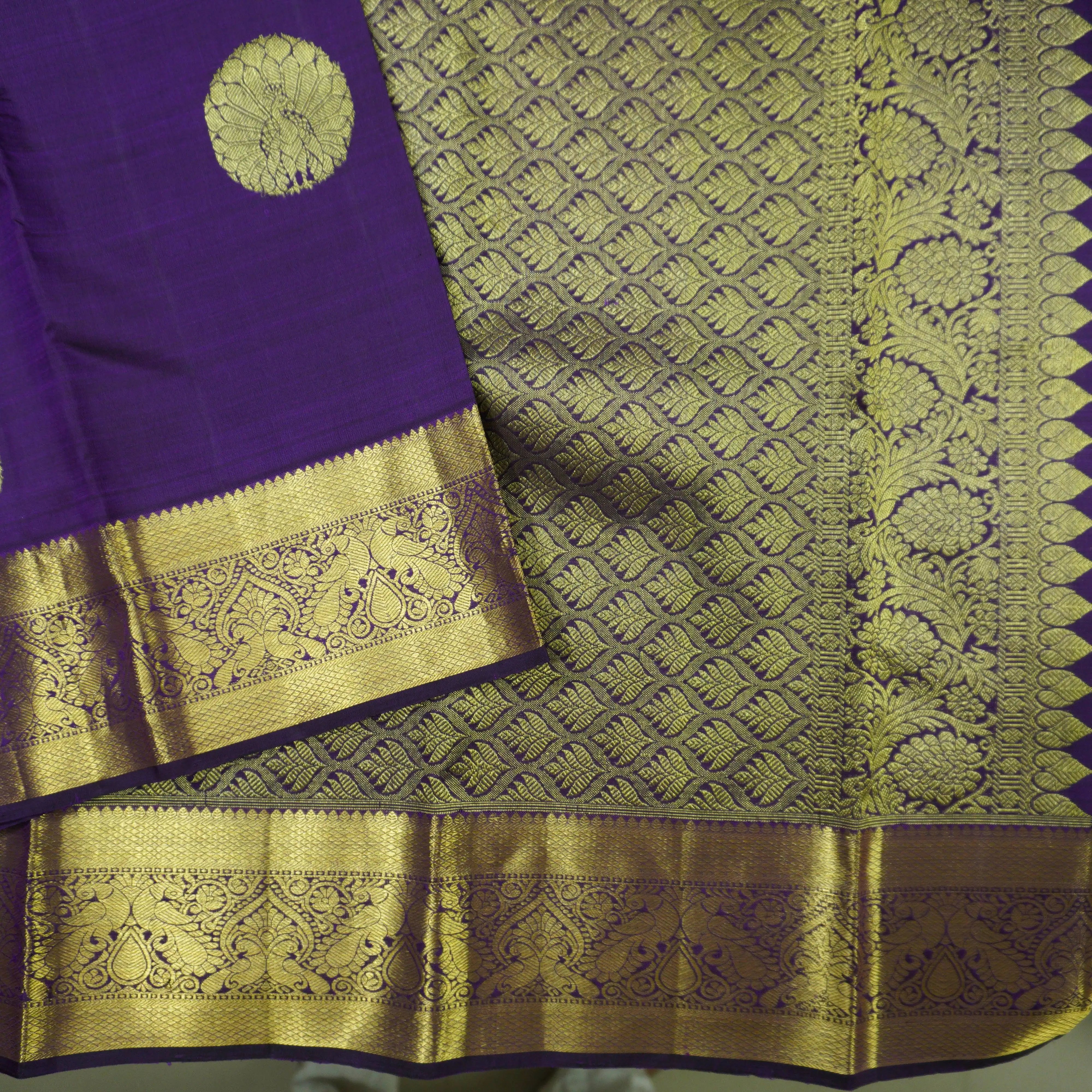 Handloom Kanchipuram Silk Saree in Navalpazham with Traditional Peacock Design