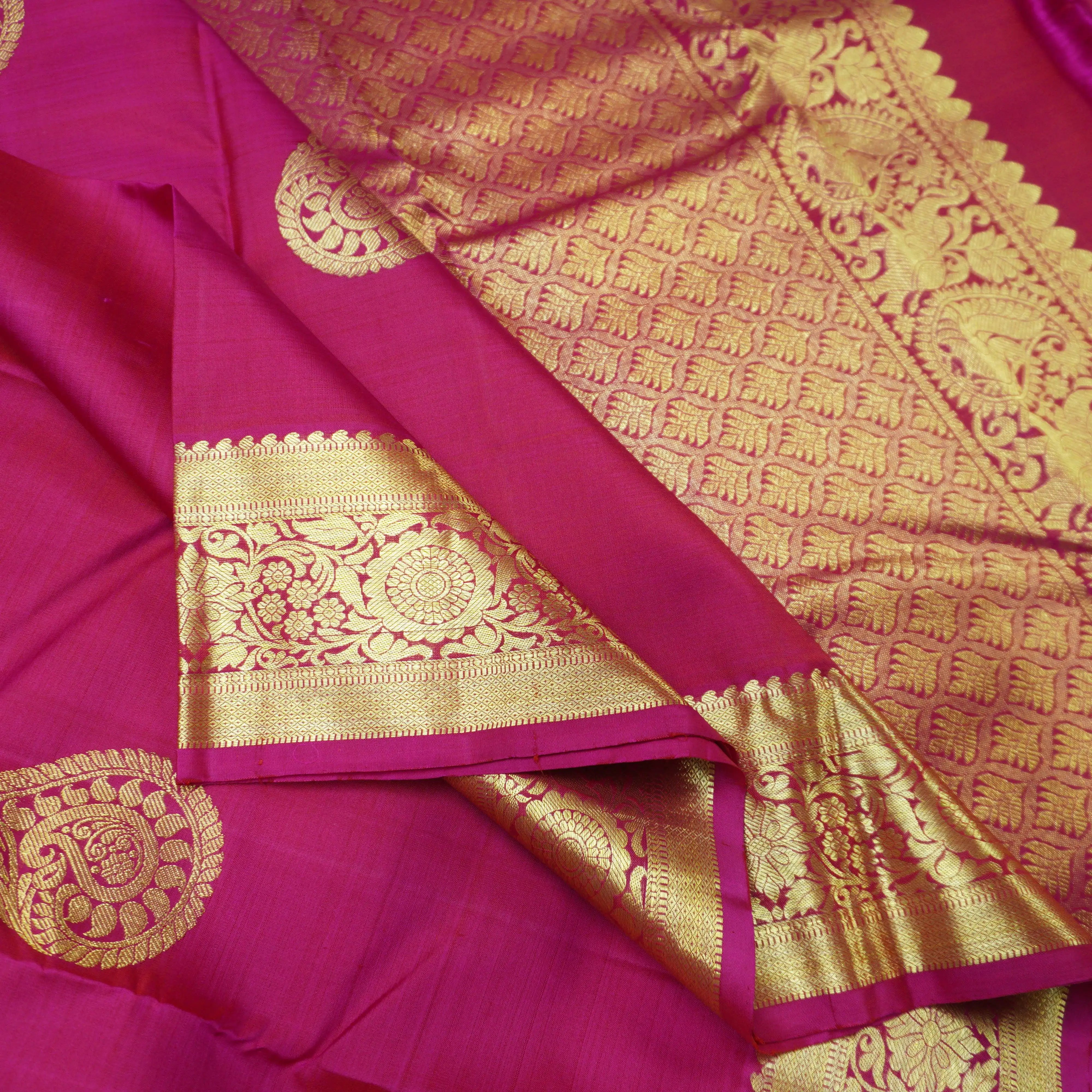 Rani Pink Kanchipuram Silk Saree with Paisley Motif and Floral Border