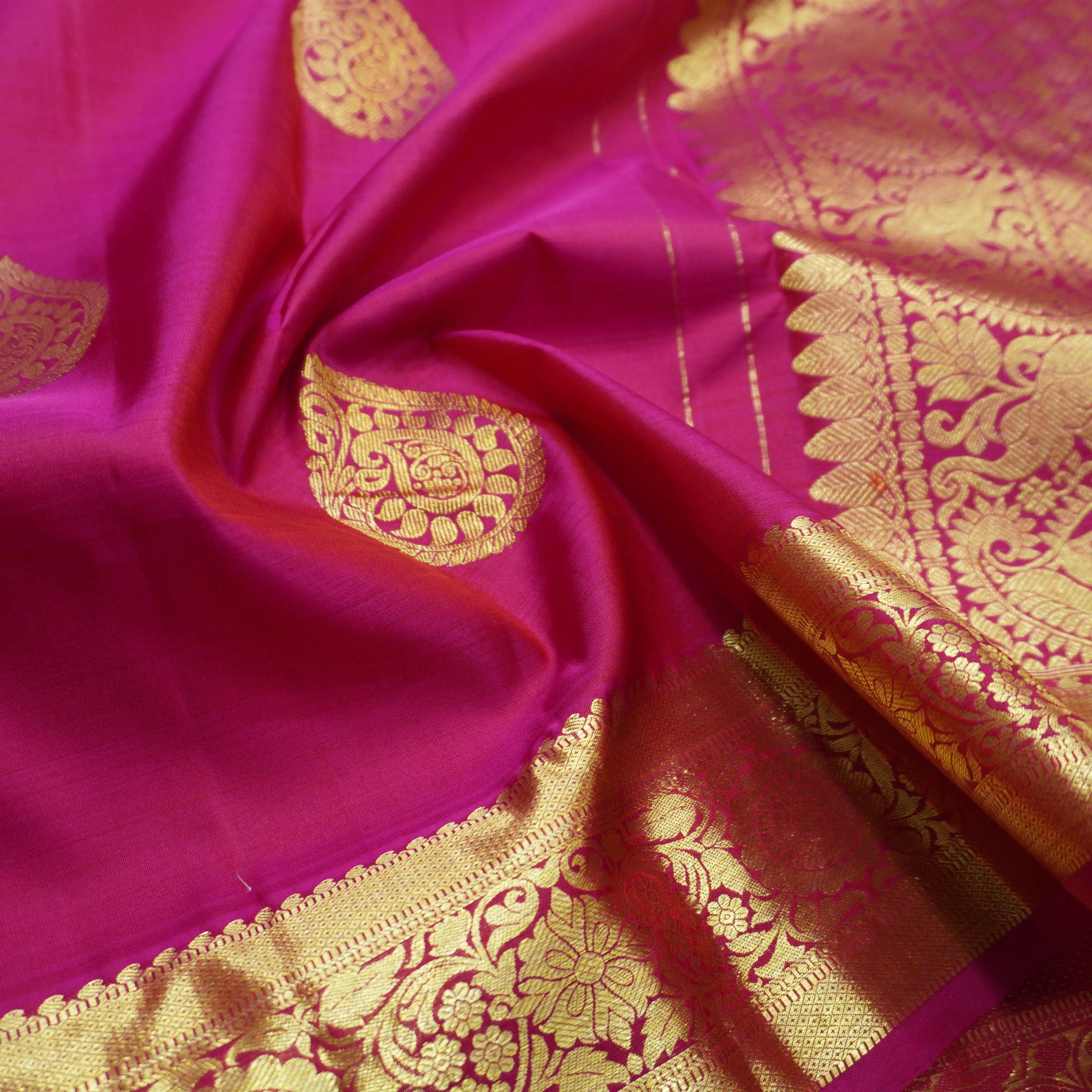 Rani Pink Kanchipuram Silk Saree with Paisley Motif and Floral Border