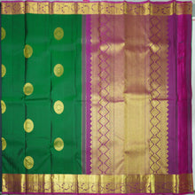 Load image into Gallery viewer, Bottle Green Kanchipuram Handloom Silk Saree with Purple Zari Border
