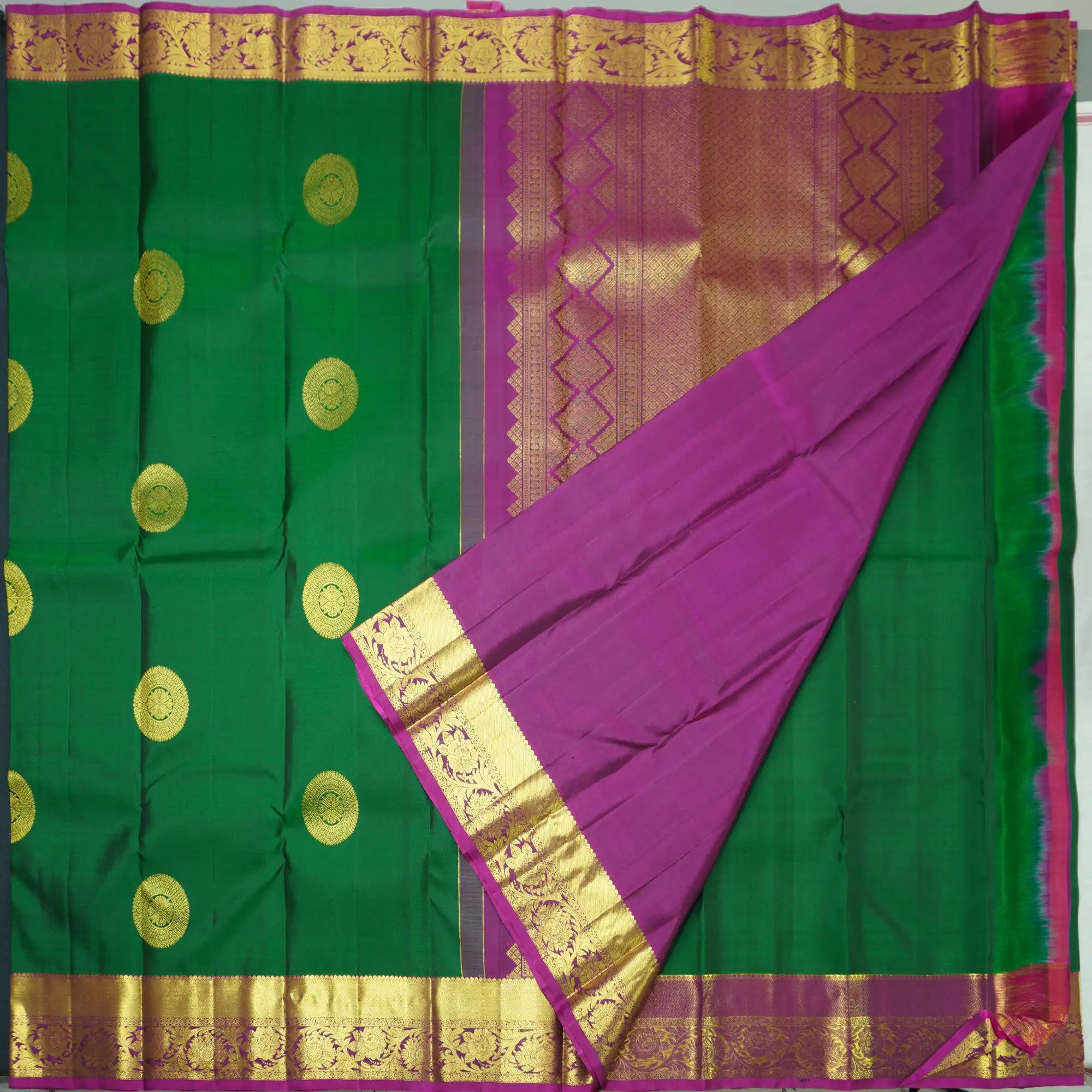 Bottle Green Kanchipuram Handloom Silk Saree with Purple Zari Border