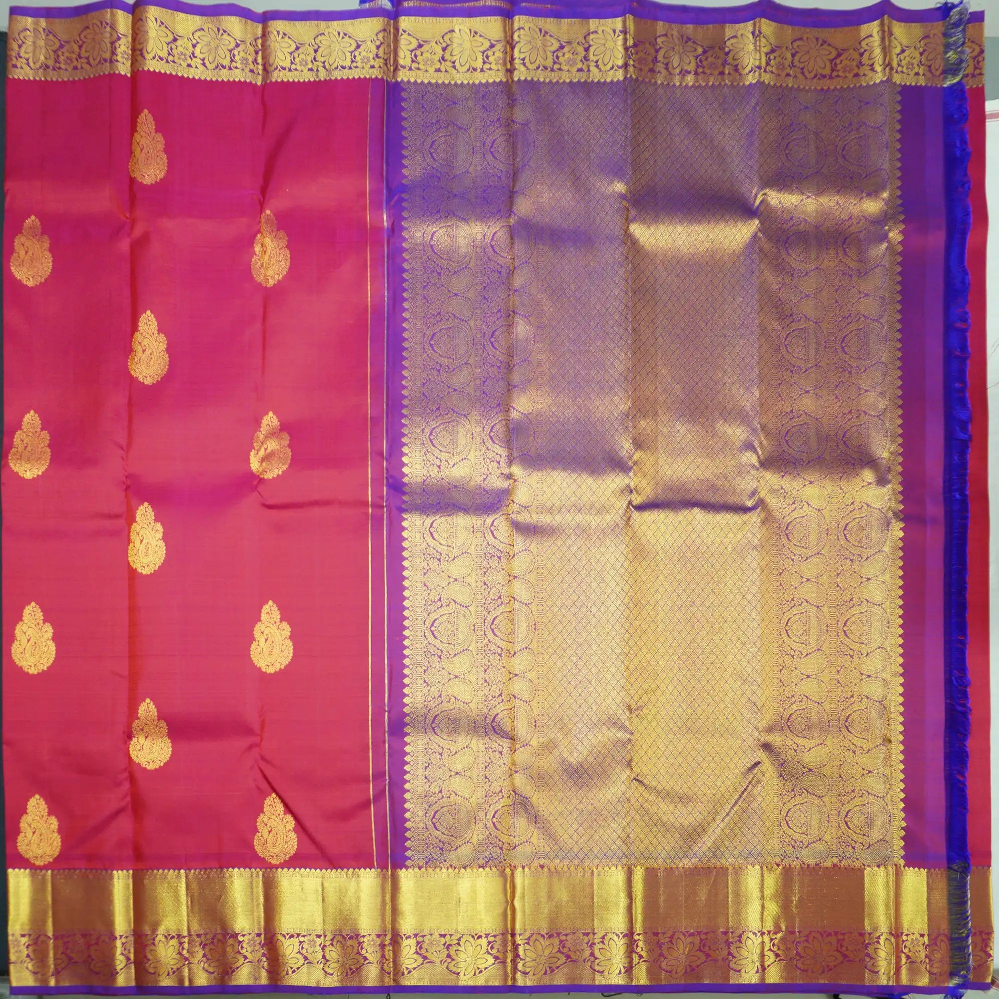 Tomato Red Kanchipuram Silk Saree with Gold Zari Butta and Blue Border