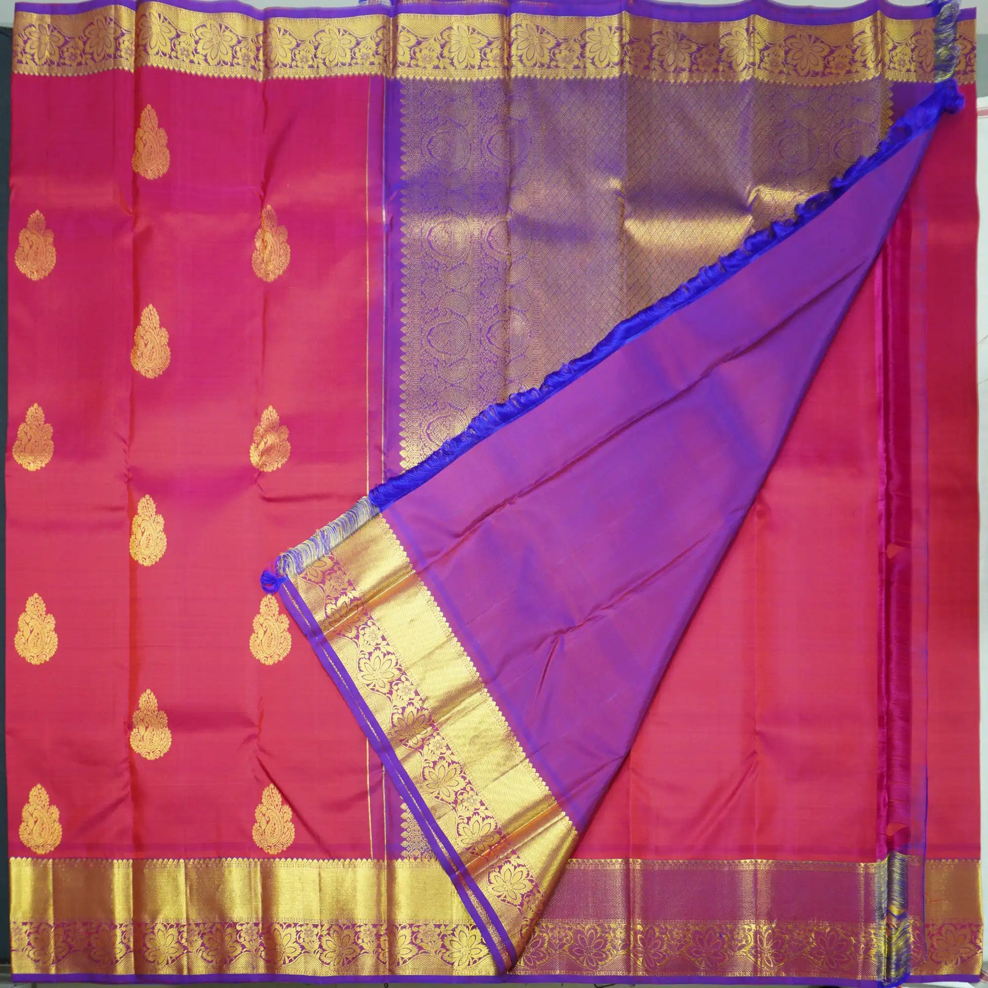 Tomato Red Kanchipuram Silk Saree with Gold Zari Butta and Blue Border