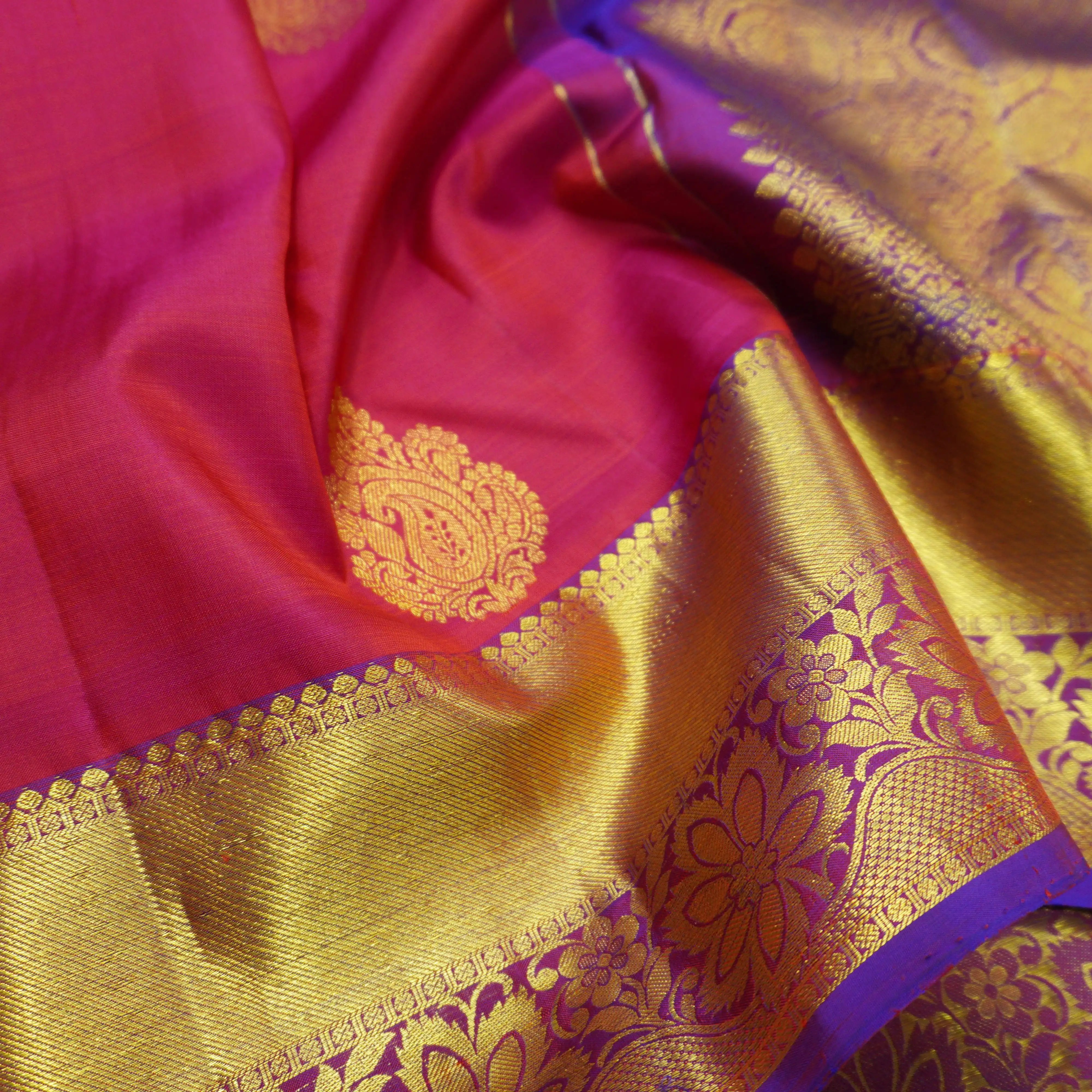 Tomato Red Kanchipuram Silk Saree with Gold Zari Butta and Blue Border