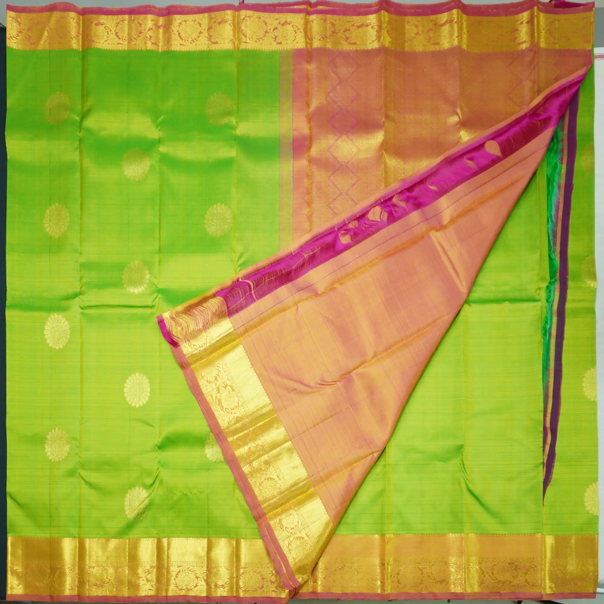 Lime Green Kanchipuram Silk Saree with Gold Zari Motifs and Blush Pink Border