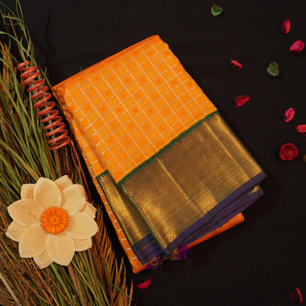 Golden Orange Kanchipuram Silk Saree with Navy Blue Bavanji Border
