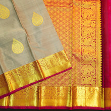 Load image into Gallery viewer, Elephant gray Kanchipuram silk saree with magenta border, gold thilagam motifs on the body, and rich zari pallu – traditional wedding saree from Vivaaha Silks.
