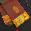 Manthulir short color Kanchipuram silk saree from Vivaaha Silks budget collection featuring golden thilagam buttas and rich zari pallu with traditional border.